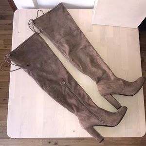 Thigh high heeled boots